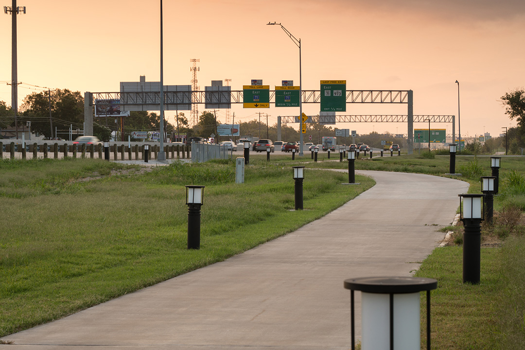 71 Trail with toll road in the distance at dusk