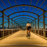 Cyclist on a 183 Trail Pedestrian Bridge