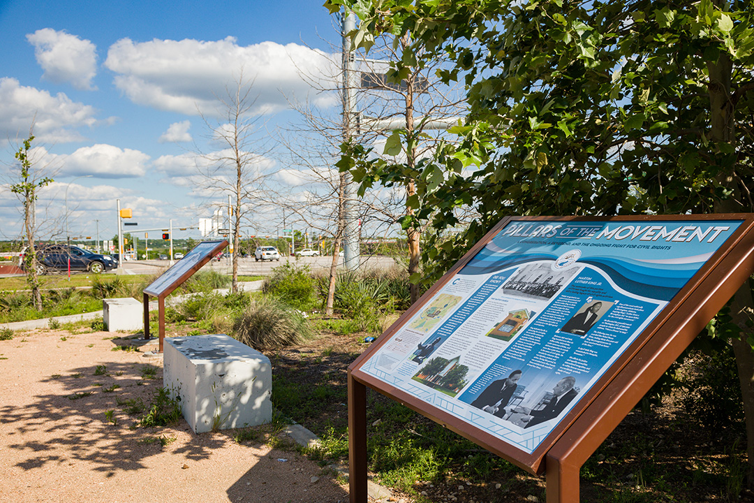 Images of trail signs in the MLK Freedom Park