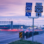 290 Toll signage and road at Dusk